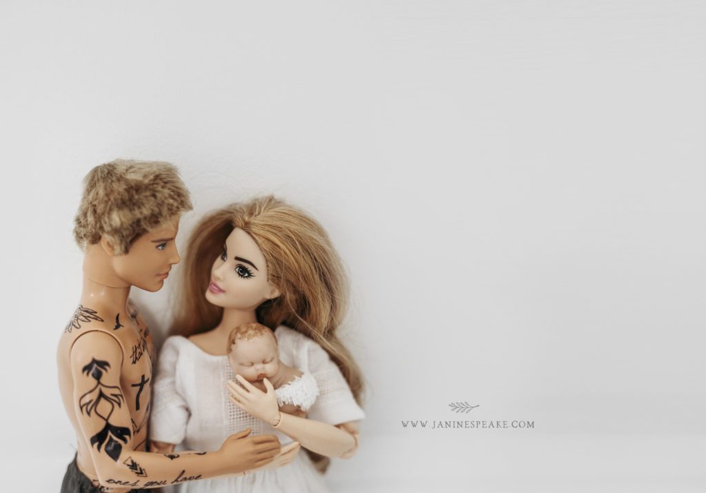 Barbie and Ken with their newborn baby