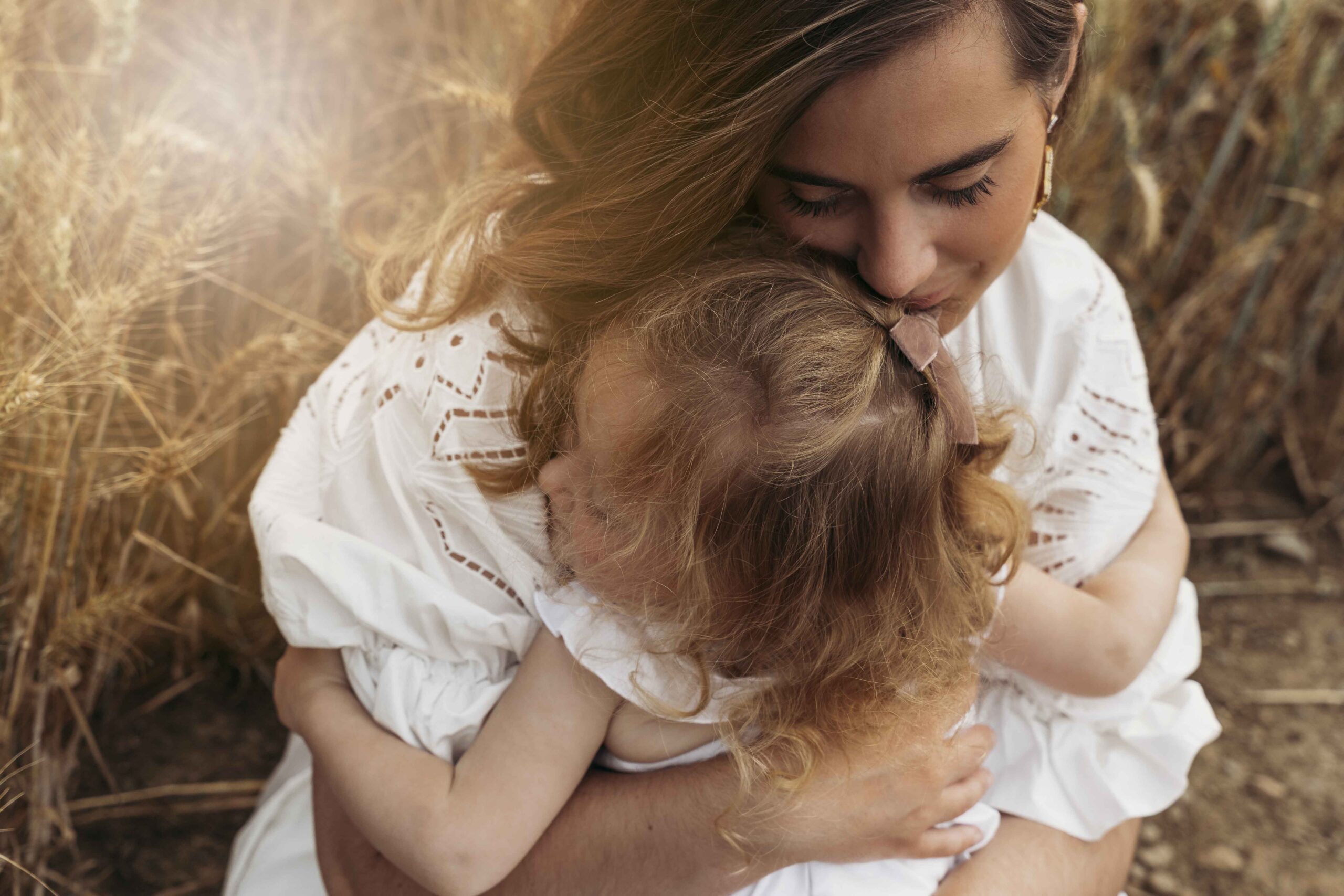 Wheat field pregnancy reveal photoshoot