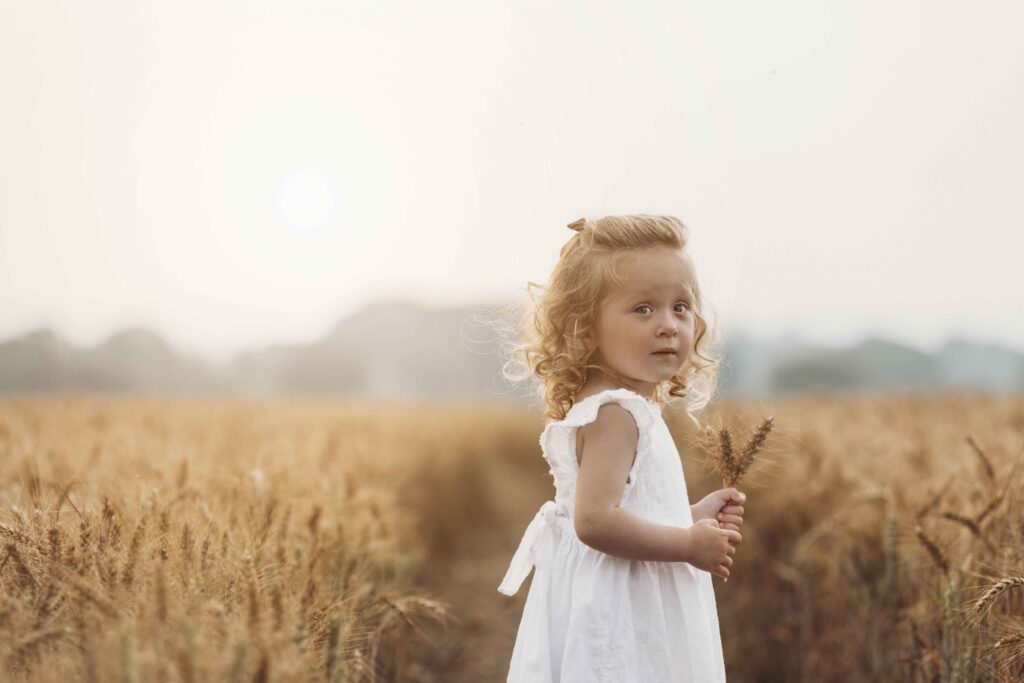 wheat field pregnancy reveal photoshoot